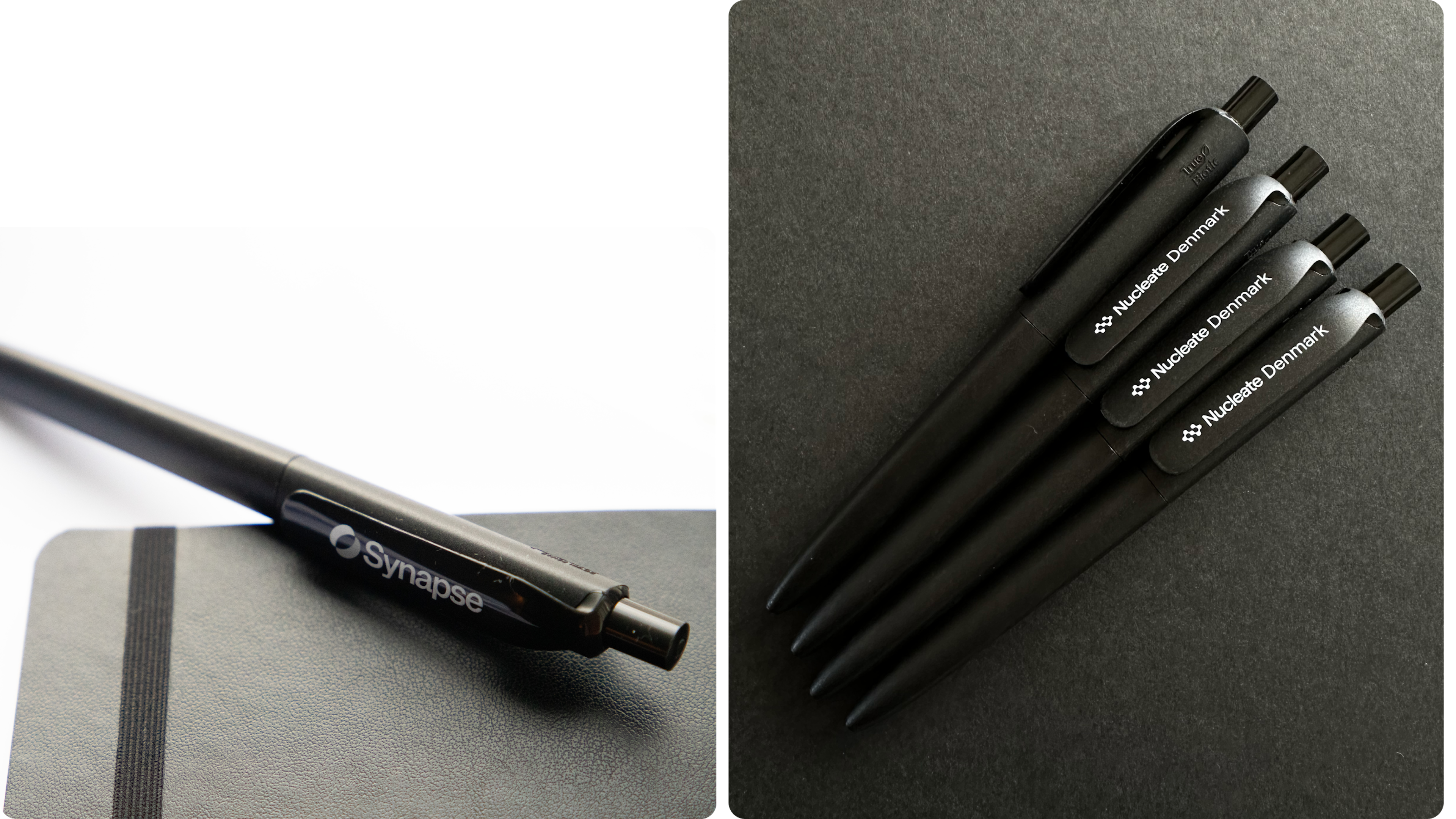 Branded black pens on a notebook and grouped on a dark surface for a premium look